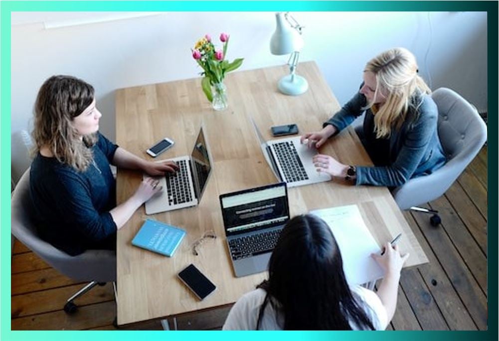 women working with frame